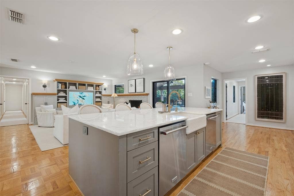 5222 Meadow Crest Drive, Dallas, TX 75229 Oversized island with double dishwashers, farm sink and storage.