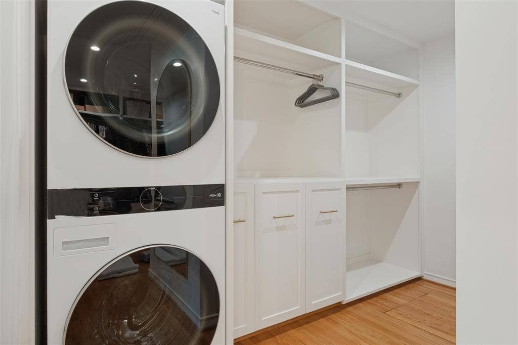 5222 Meadow Crest Drive, Dallas, TX 75229 Washer & dryer in primary master closet for ease with lots of storage.