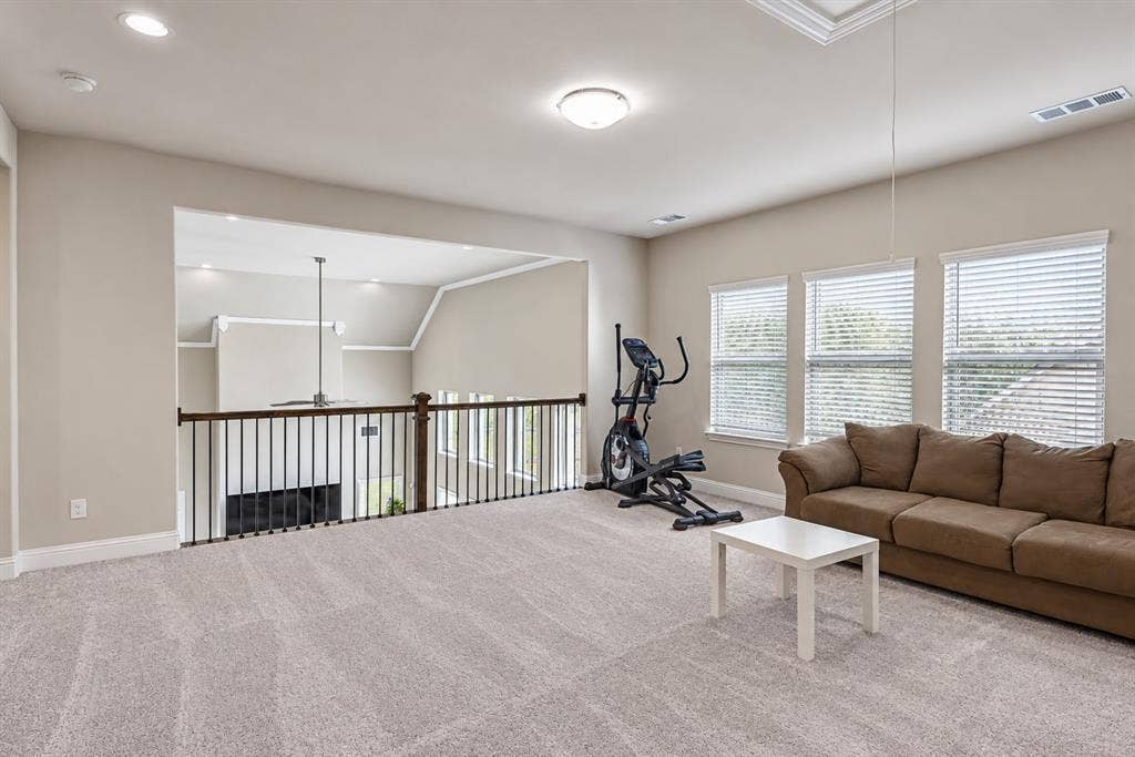 1603 Coventry Court, Farmers Branch, TX 75234 Carpeted open loft space with recessed lighting and a ceiling-mounted light fixture