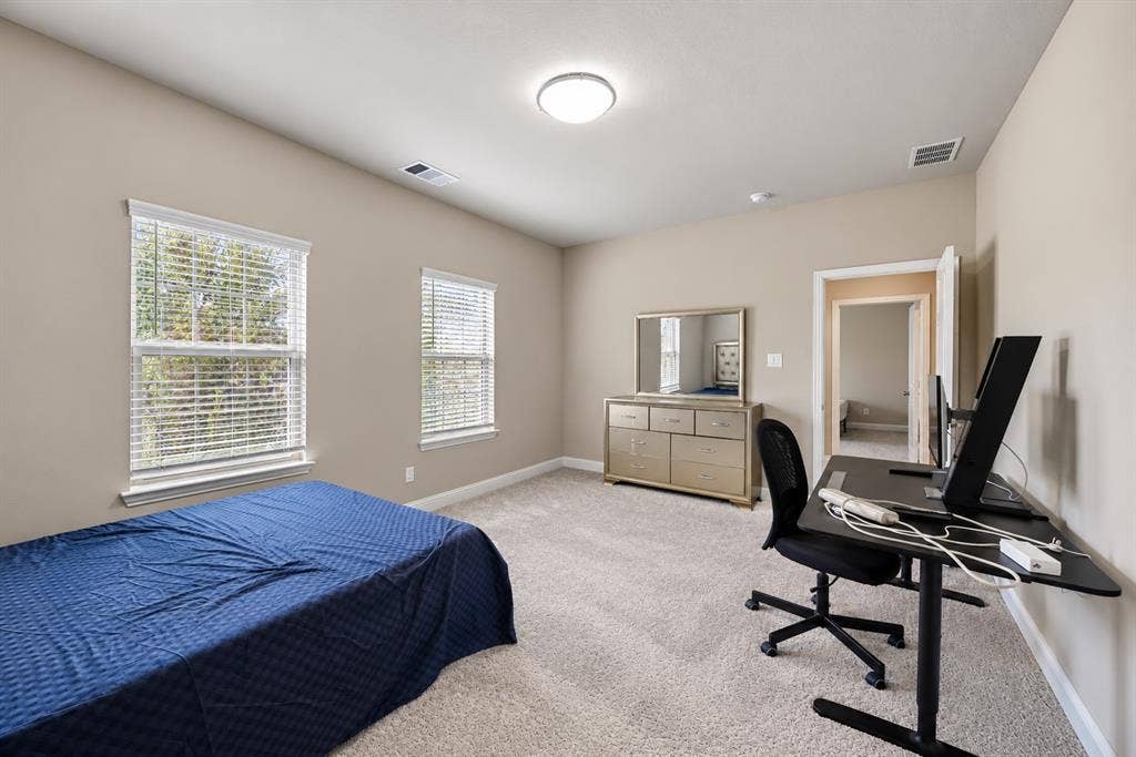 1603 Coventry Court, Farmers Branch, TX 75234 Plush carpet flooring complements neutral wall tones