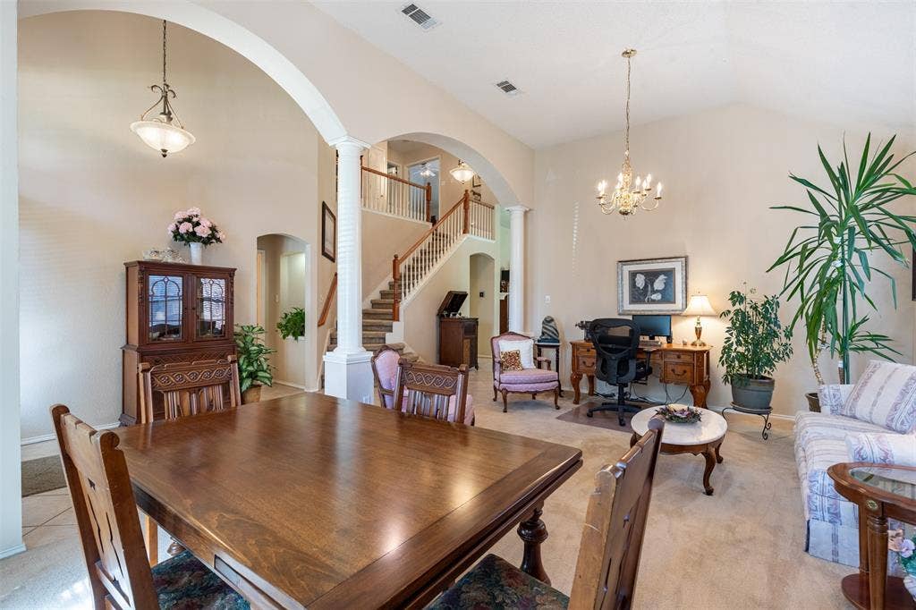 10208 Noel Drive, Frisco, TX 75035 Open-concept living and dining rooms.
