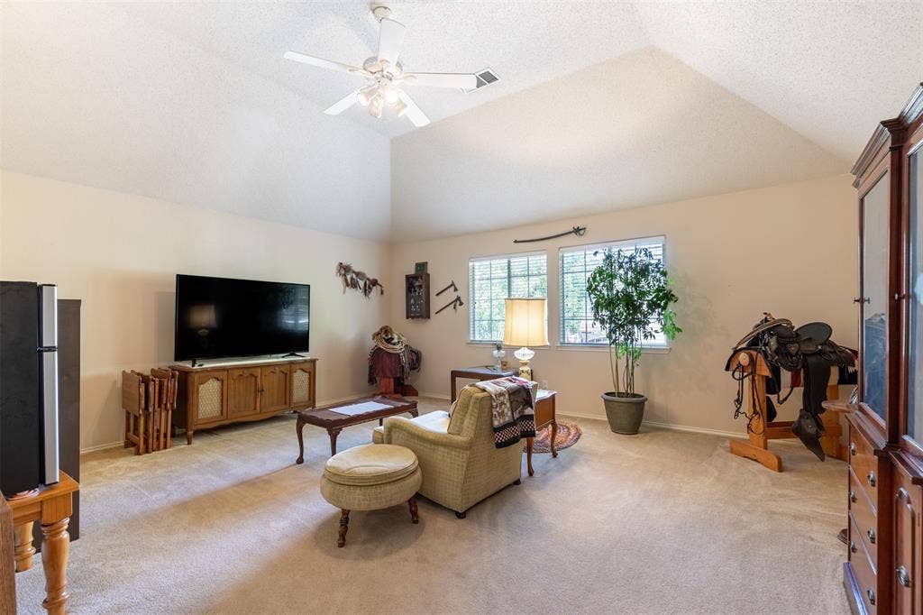 10208 Noel Drive, Frisco, TX 75035 Game room with vaulted ceiling.