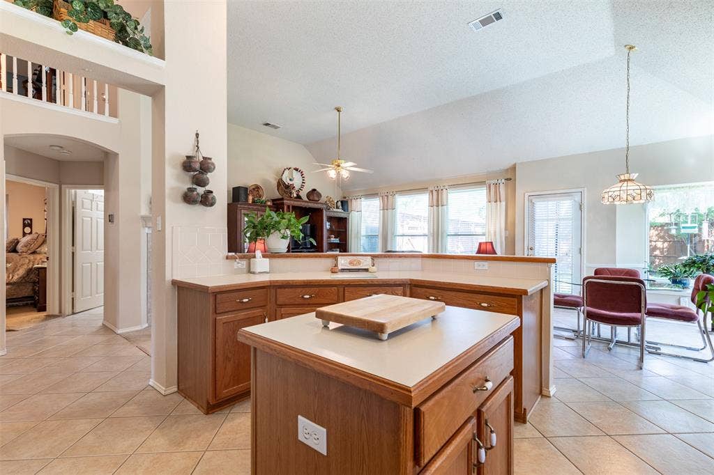 10208 Noel Drive, Frisco, TX 75035 Kitchen features wrap around breakfast bar.