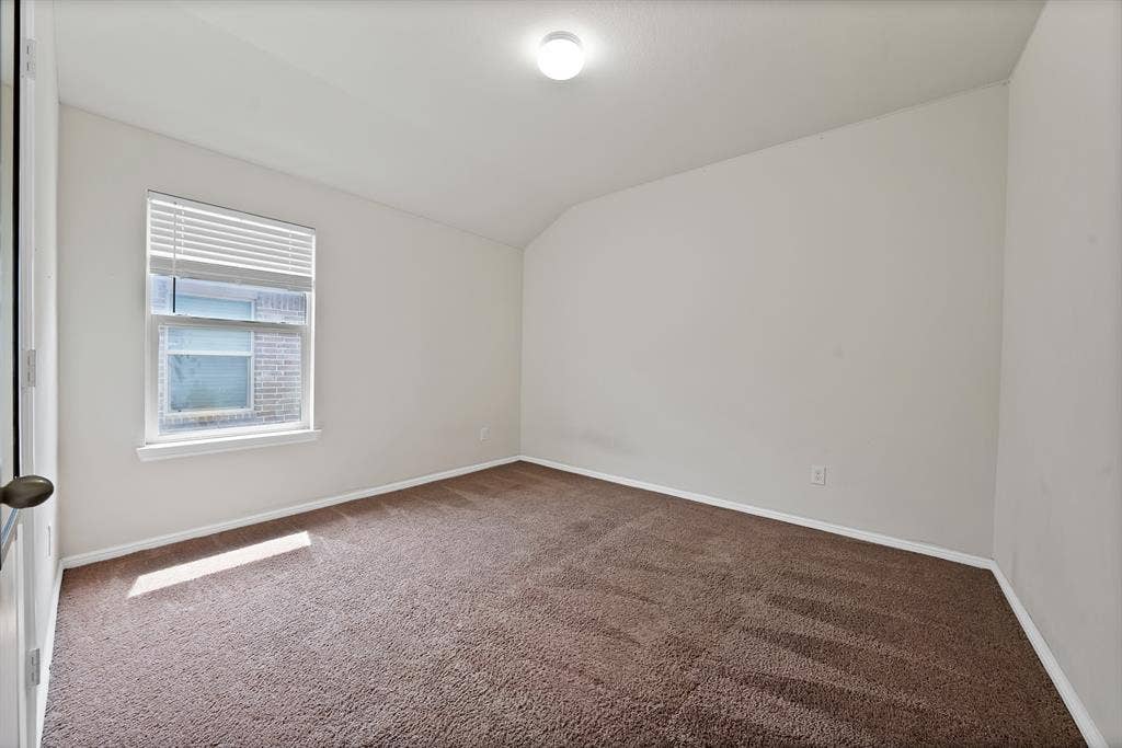 228 Foxhunter Street, Fort Worth, TX 76131 Neutral wall finishes, recessed window with blinds, and brown carpet flooring