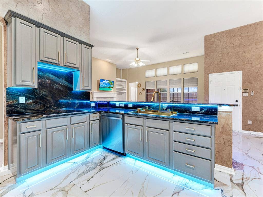 LED accents illuminate the counters and reflect across the glossy floor in whichever color you prefer. Set the mood for a casual evening of cooking and catching up.