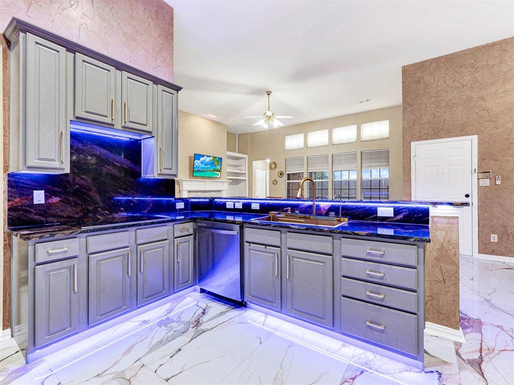 Your choice of LED color transforms the kitchen’s glow, outlining the cabinetry with a look that suits the moment. Ease into the evening with soft lighting and a warm cup of tea.
