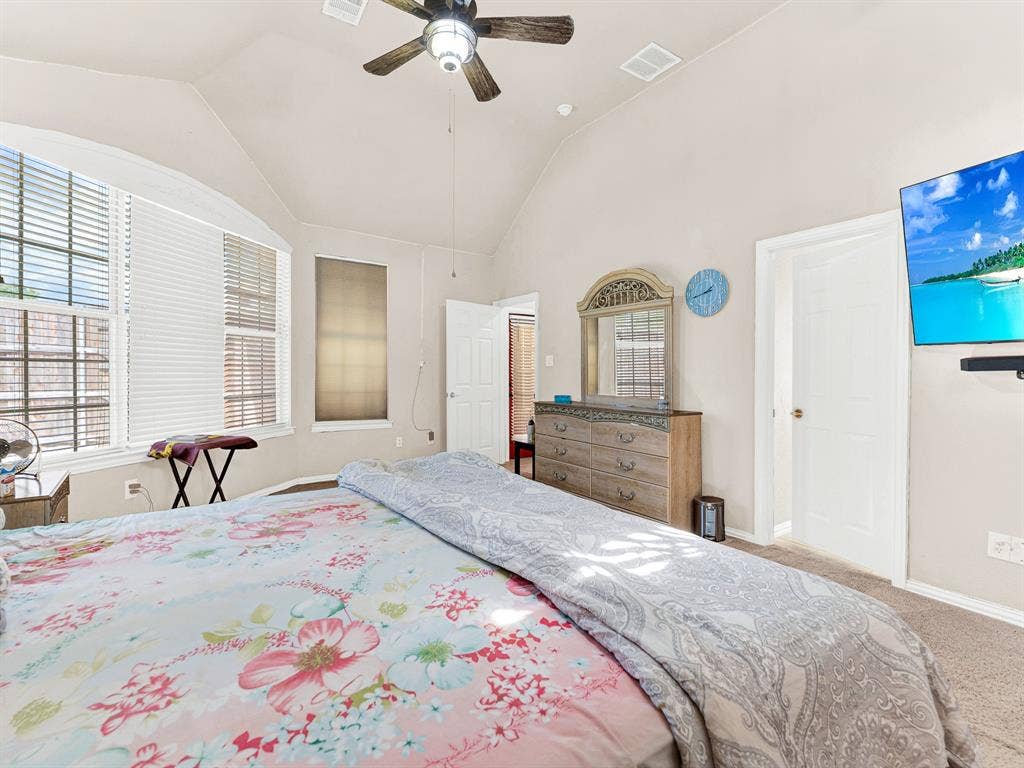 A generous bedroom bay window creates a bright alcove with views toward the pool and room for a personal reading corner. Escape into a few chapters on a lazy afternoon with the water just beyond the glass.