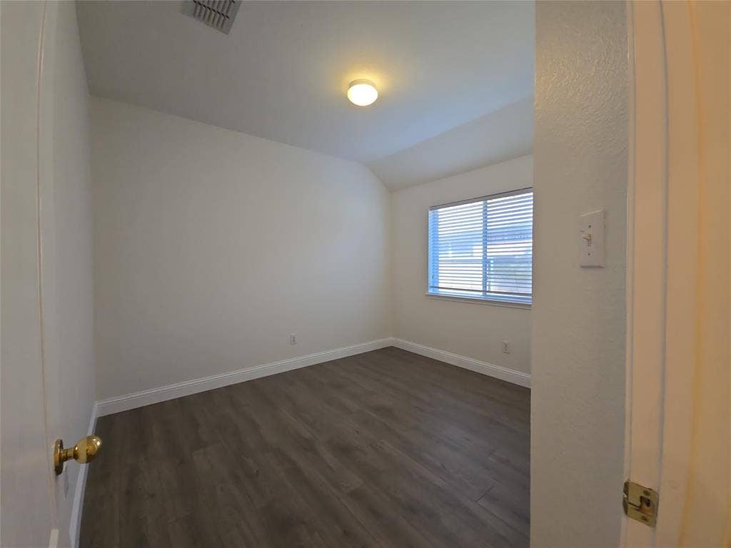 1545 Crystal Pass, Allen, TX 75002 Wood-finish flooring with white baseboards, recessed window with horizontal blinds, and a ceiling-mounted light fixture