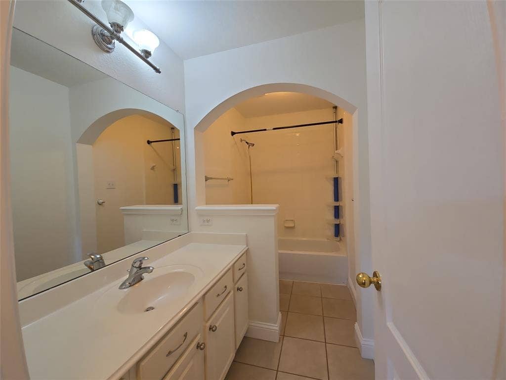 1545 Crystal Pass, Allen, TX 75002 Double vanity with integrated sink, chrome faucet, and under-cabinet storage