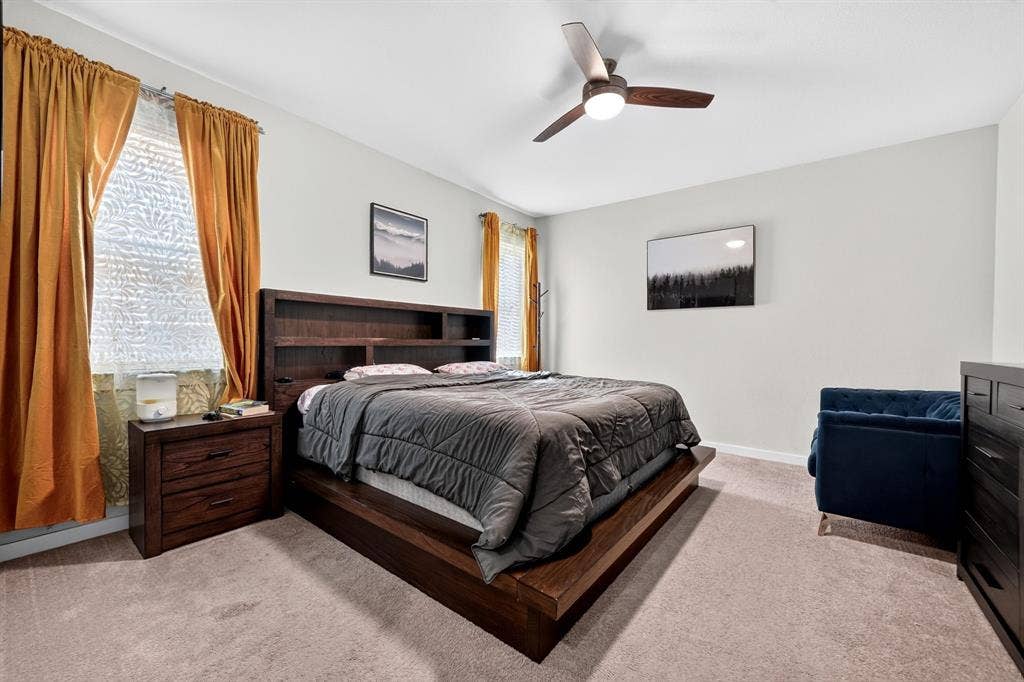 5534 Yarborough Drive, Forney, TX 75126 Spa-inspired primary bathroom featuring a frameless glass-enclosed shower with subway tile surround, dual vanity with white quartz countertop and matte black fixtures, recessed ceiling lighting, and ceramic tile flooring throughout