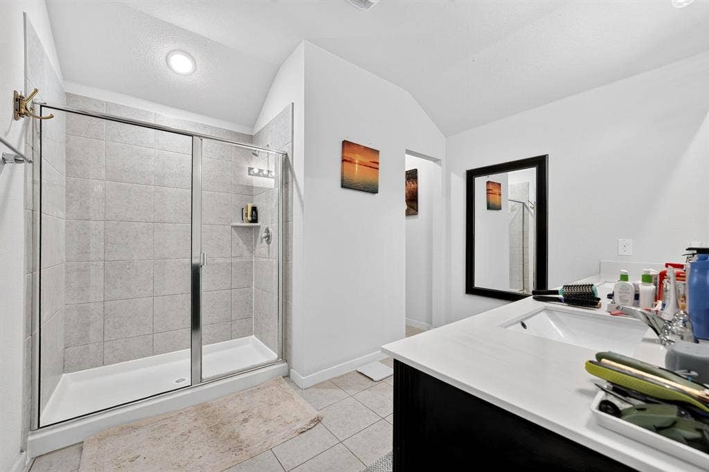5534 Yarborough Drive, Forney, TX 75126 Neutral wall color, carpeted flooring, window with blinds, ceiling fan with integrated lighting, and a compact corner table