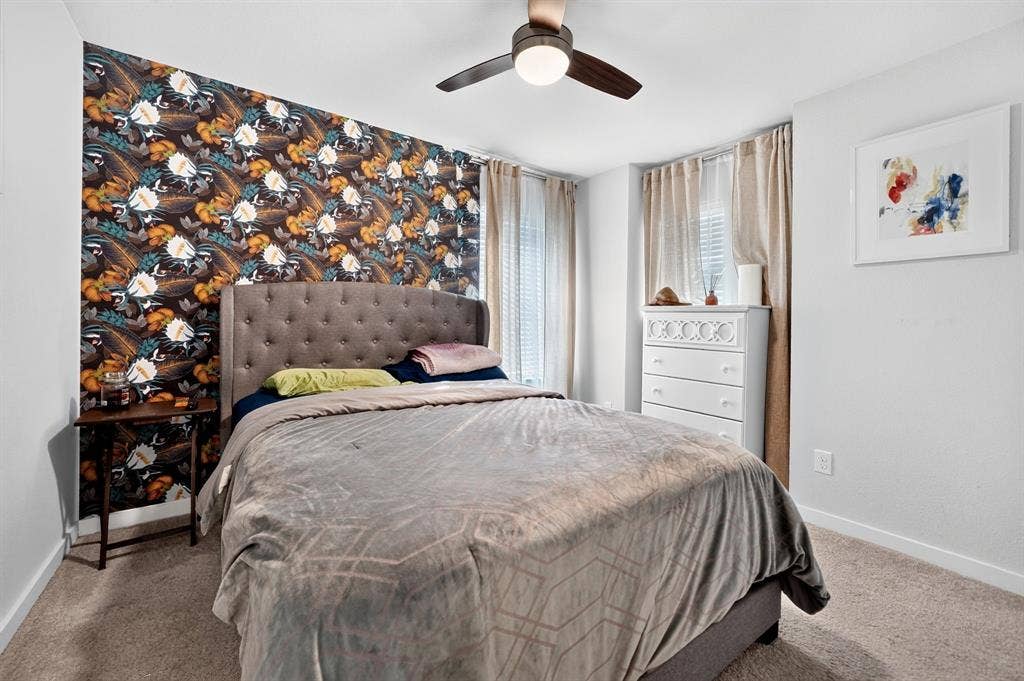 5534 Yarborough Drive, Forney, TX 75126 Accent wall featuring patterned wallpaper