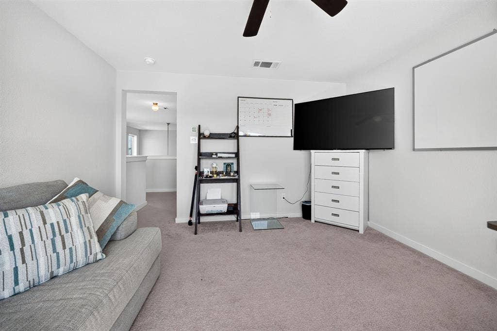 5534 Yarborough Drive, Forney, TX 75126 Neutral-toned wall-to-wall carpeting throughout