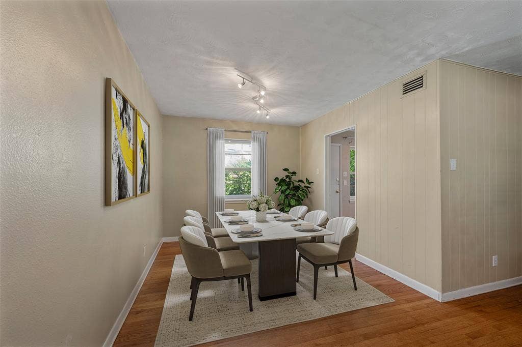 7735 Deer Trail Drive, Dallas, TX 75238 Virtually staged dining