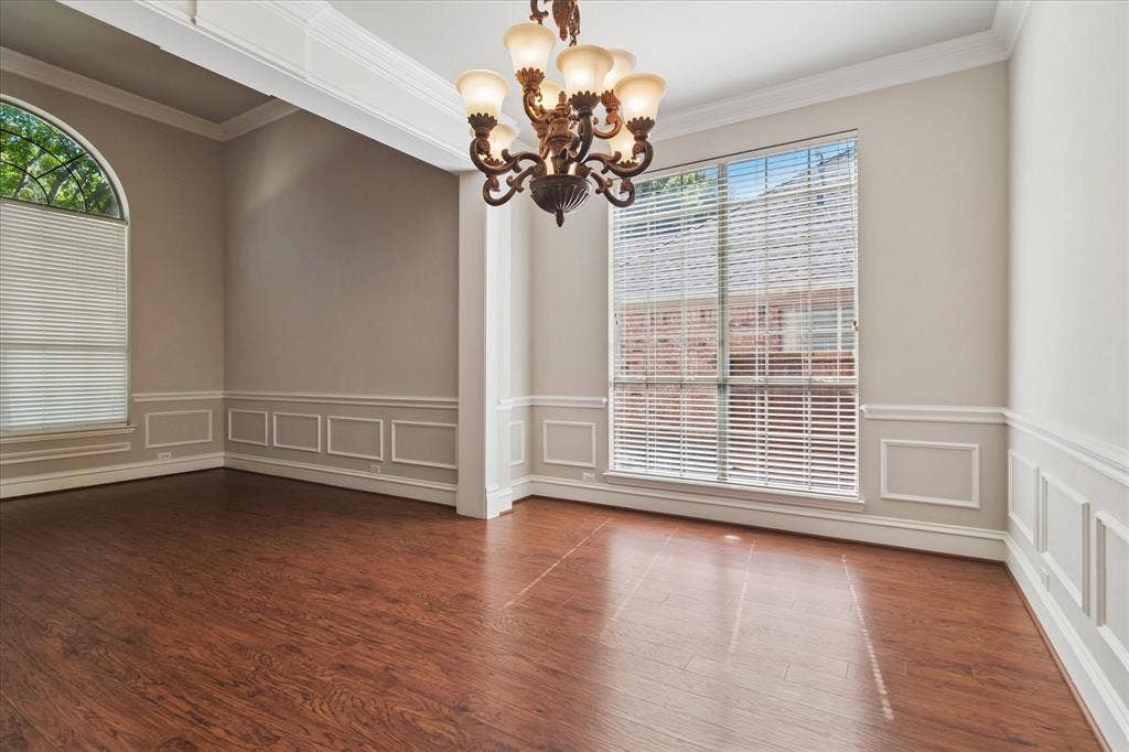 8323 Albritton Drive, Frisco, TX 75036 Wood-finish flooring with decorative wainscoting and crown molding