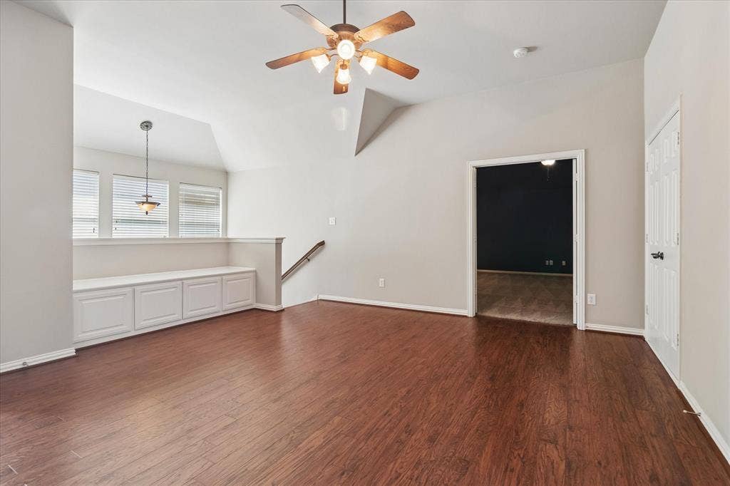 8323 Albritton Drive, Frisco, TX 75036 Wood-finish flooring throughout, vaulted ceiling, and recessed lighting