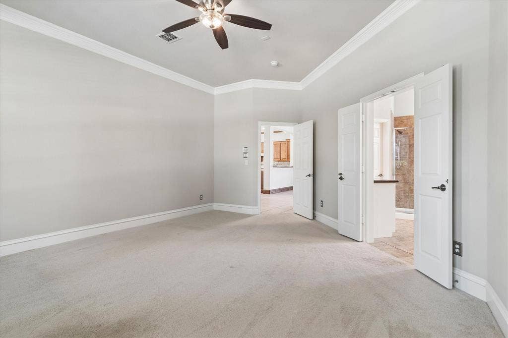 8323 Albritton Drive, Frisco, TX 75036 Recessed lighting, crown molding, double doors, ceiling fan, and carpet flooring