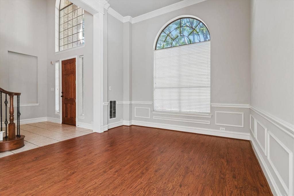 8323 Albritton Drive, Frisco, TX 75036 Wood-finish flooring with tile entry