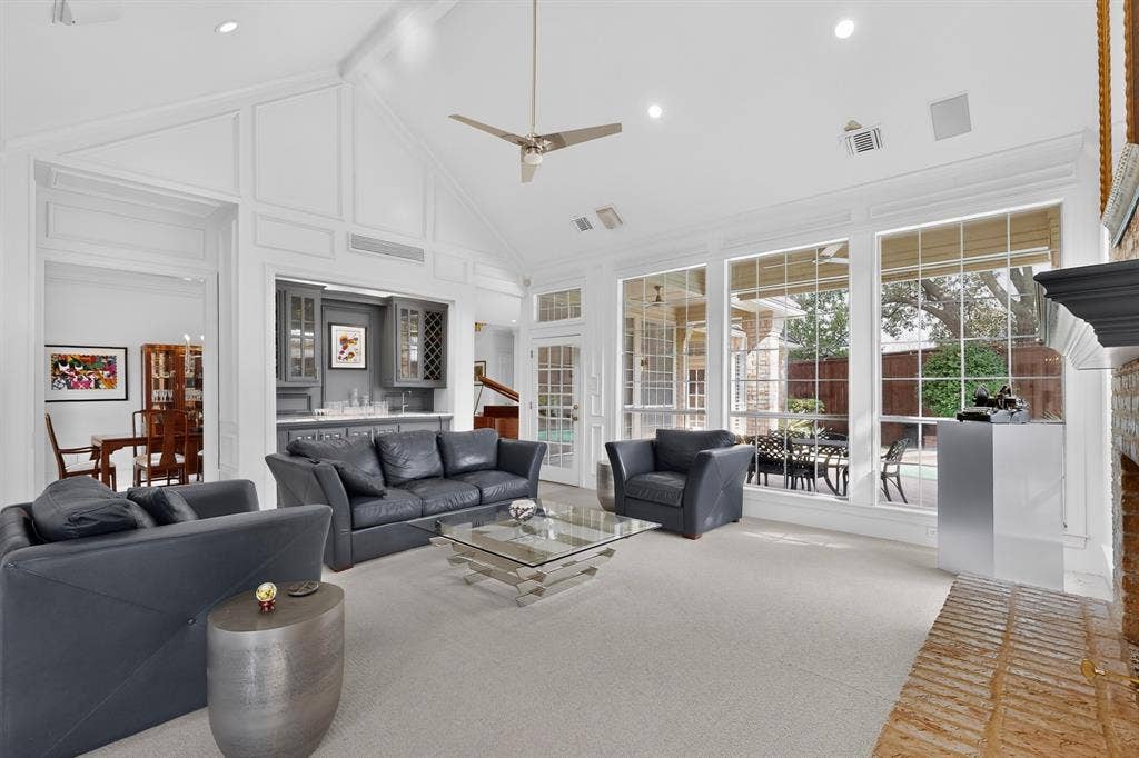 4536 Briar Oaks Circle, Dallas, TX 75287 Vaulted ceiling with decorative molding, recessed lighting, and a ceiling fan