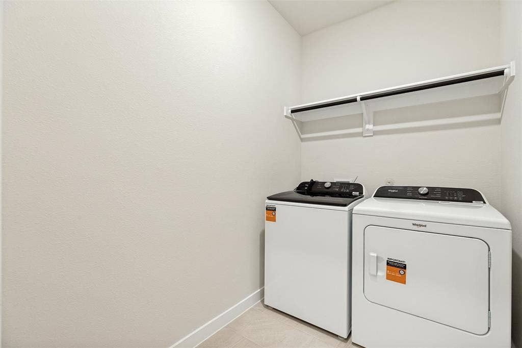 1006 Angel Street, Josephine, TX 75173 Laundry Made Easy! - The dedicated laundry room comes complete with a Whirlpool washer and dryer, durable tile flooring, and overhead shelving for additional storage. Another move-in-ready convenience that saves you an extra expense!