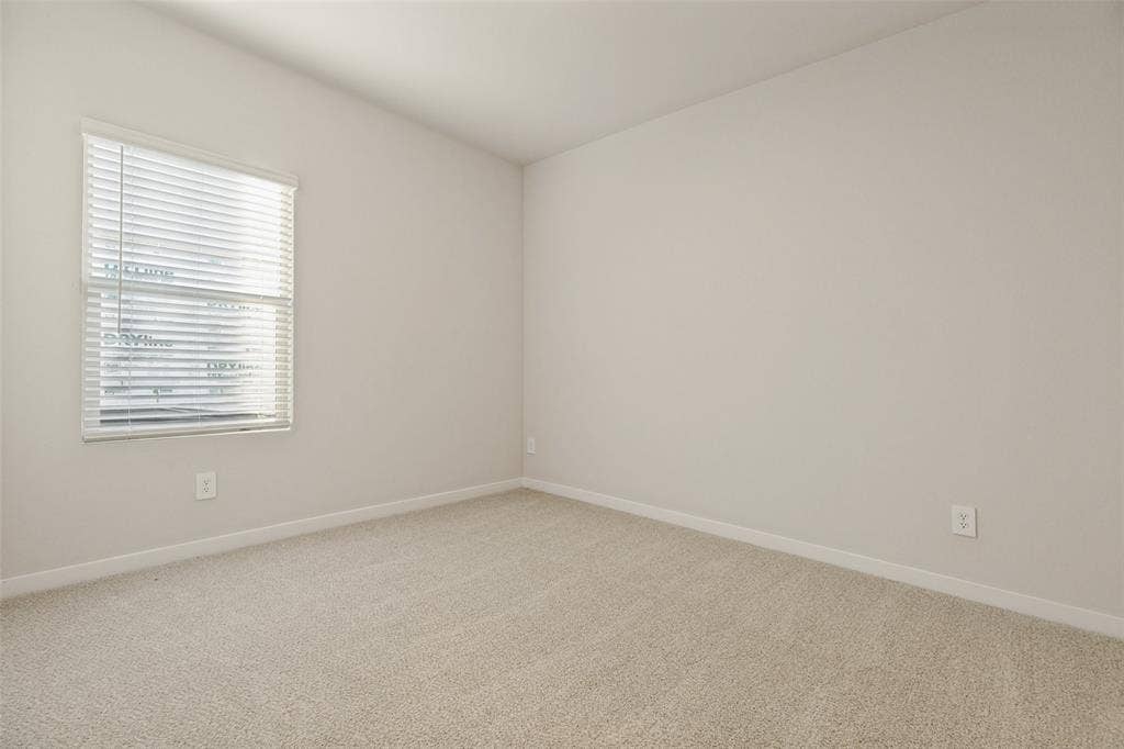 1006 Angel Street, Josephine, TX 75173 Versatility for the Way You Live! - Whether you need a comfortable bedroom, dedicated workspace, or hobby room, this flexible space offers a practical layout, natural light, and neutral finishes that make it easy to personalize.