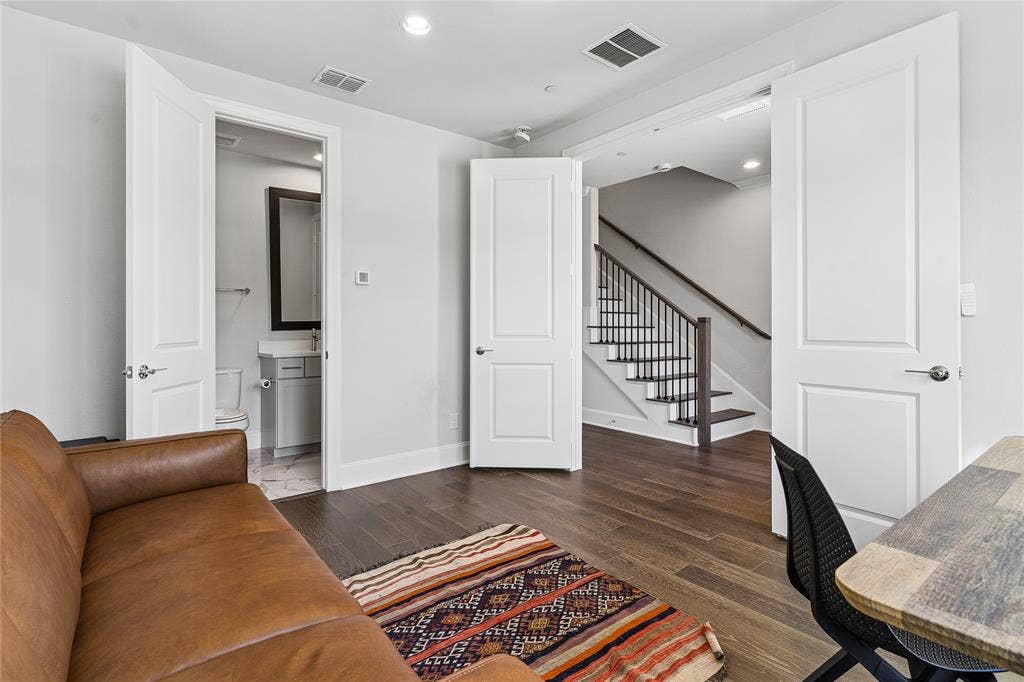 First floor guest bedroom offers privacy for guests or a home office.