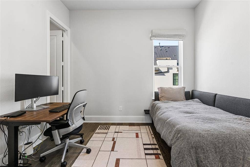 Third floor guest bedroom features en suite bathroom.