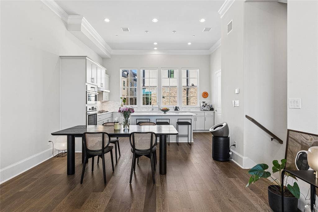 Twelve-foot ceilings and an open floor plan create an airy, spacious main living area.12-foot ceilings and an open floorplan contribute to a sense of space.