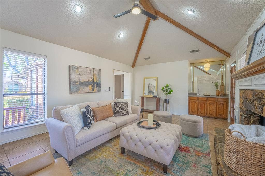 410 W Oak Street, Wylie, TX 75098 Vaulted ceiling with exposed wood beams and recessed lighting