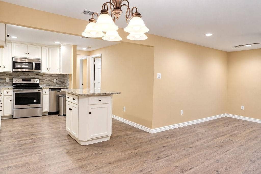 507 Morris Street, Terrell, TX 75160 Dinning area with open concept to the Kitchen with island and living room.