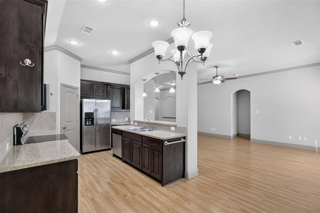 KITCHEN OPEN TO THE LIVING ROOM