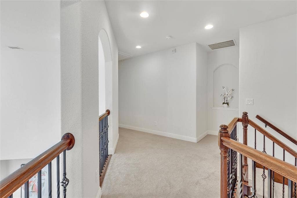8730 Isaac Street, Plano, TX 75024 Hall with an upstairs landing, carpet floors, and recessed lighting