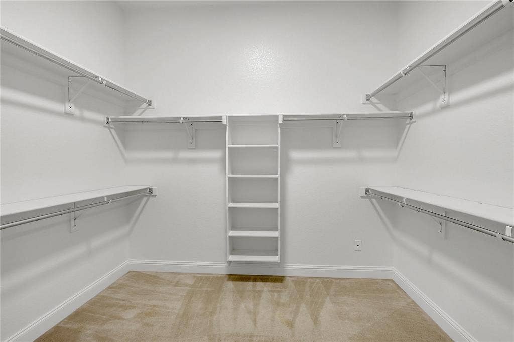 8730 Isaac Street, Plano, TX 75024 Spacious closet with light colored carpet