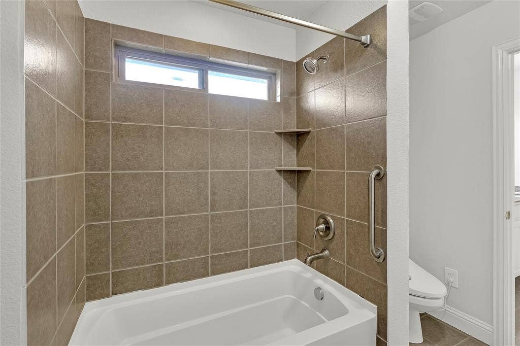 8730 Isaac Street, Plano, TX 75024 Full bath with toilet and shower combination