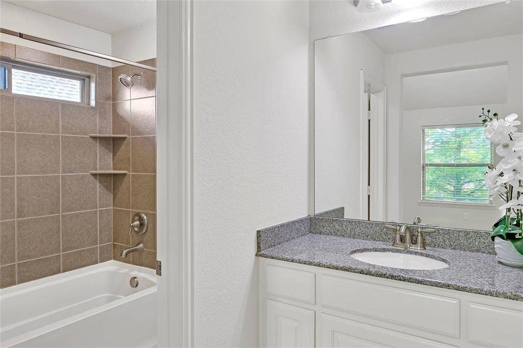 8730 Isaac Street, Plano, TX 75024 Full bath featuring shower combination and vanity