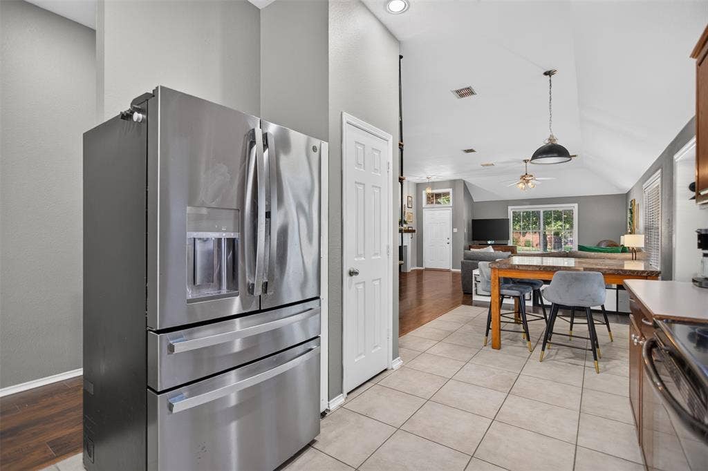 4001 Bridge Water Road, Heartland, TX 75126 kitchen with stainless steel appliances