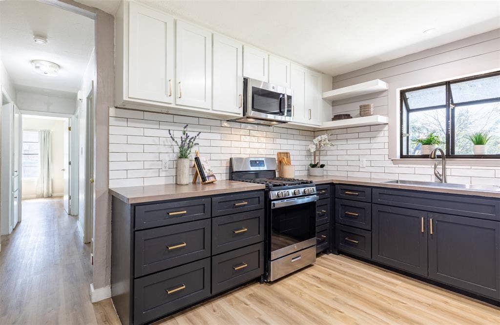 Kitchen features pull out drawers for storage.