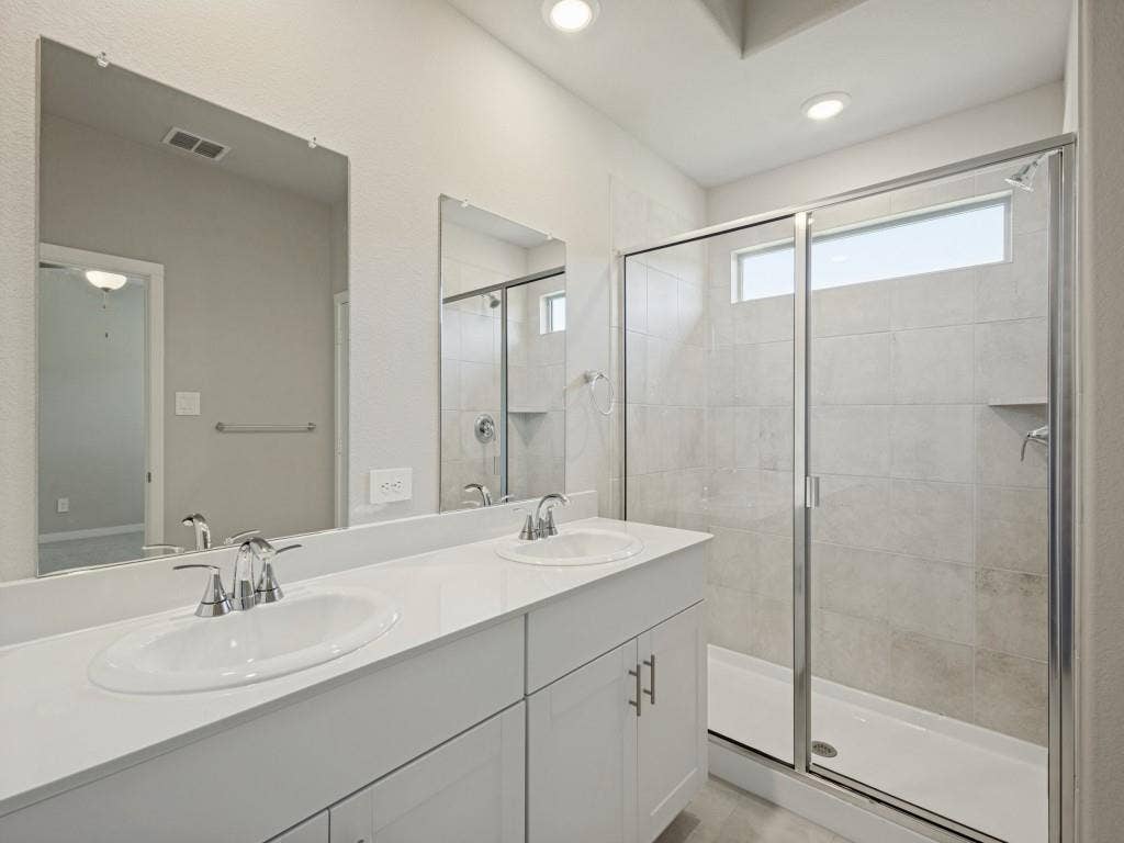6207 Castamere Drive, Princeton, TX 75071 Big walk in shower with dual vanities