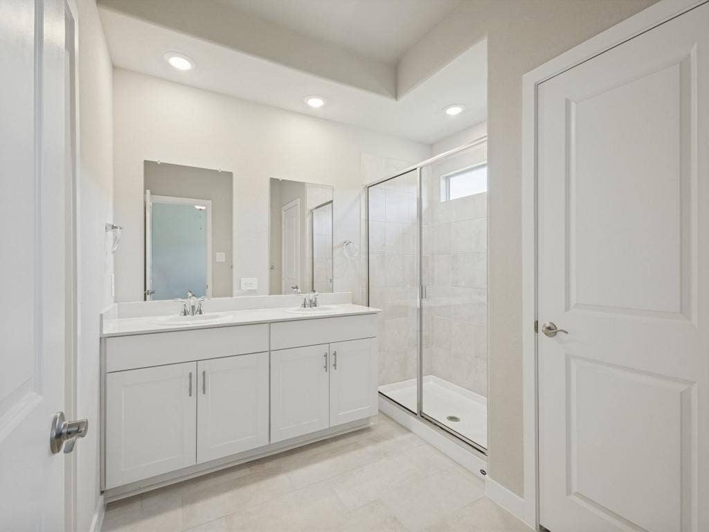 6207 Castamere Drive, Princeton, TX 75071 Dual vanities, standing shower and linen closet