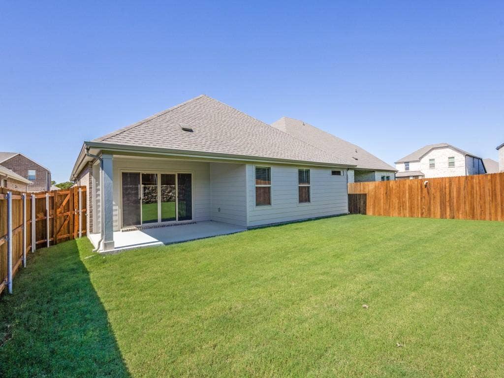 6207 Castamere Drive, Princeton, TX 75071 Backyard with privacy fence