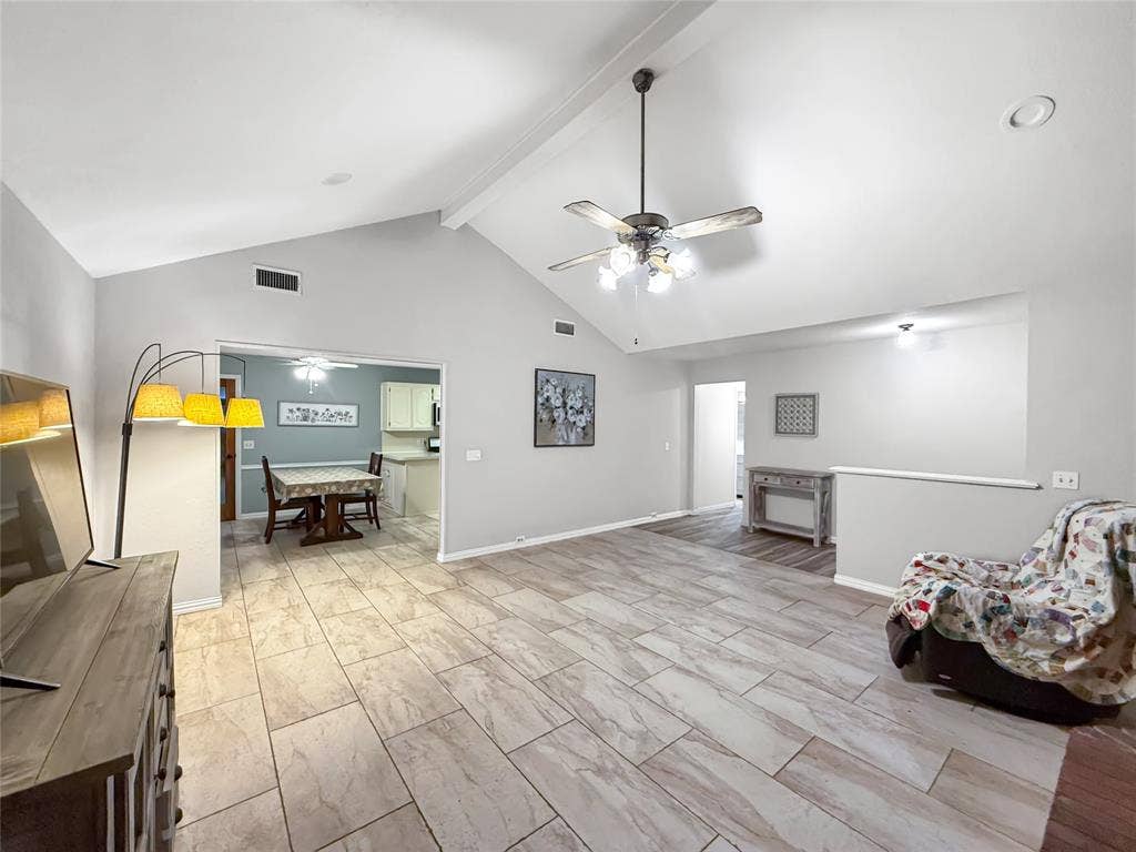 316 N Winding Oaks Drive, Wylie, TX 75098 Vaulted ceiling with exposed beam, ceramic tile flooring, recessed lighting, and ceiling fan