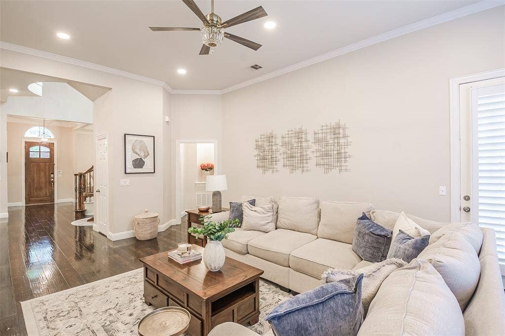 5925 Westmont Drive, Plano, TX 75093 Wood-finish flooring, recessed lighting, ceiling fan, crown molding, and plantation shutters
