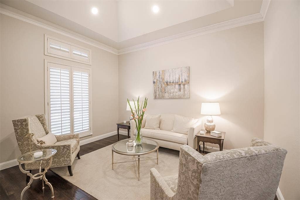 5925 Westmont Drive, Plano, TX 75093 Wood-finish flooring, crown molding, plantation shutters, recessed lighting, and a tray ceiling