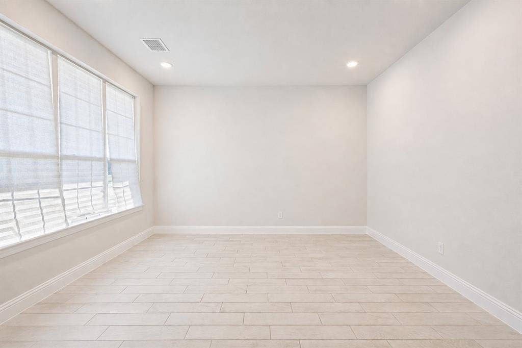 2902 Cremini Fls, Princeton, TX 75407 Recessed lighting with light-toned wood-finish flooring, large windows, and a neutral color palette