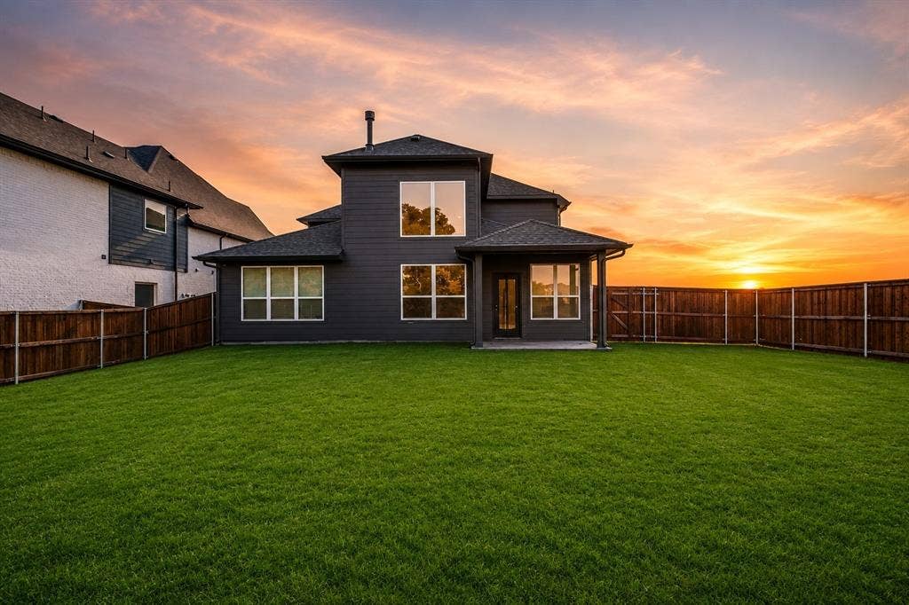 2902 Cremini Fls, Princeton, TX 75407 Expansive lawn with a full privacy fence
