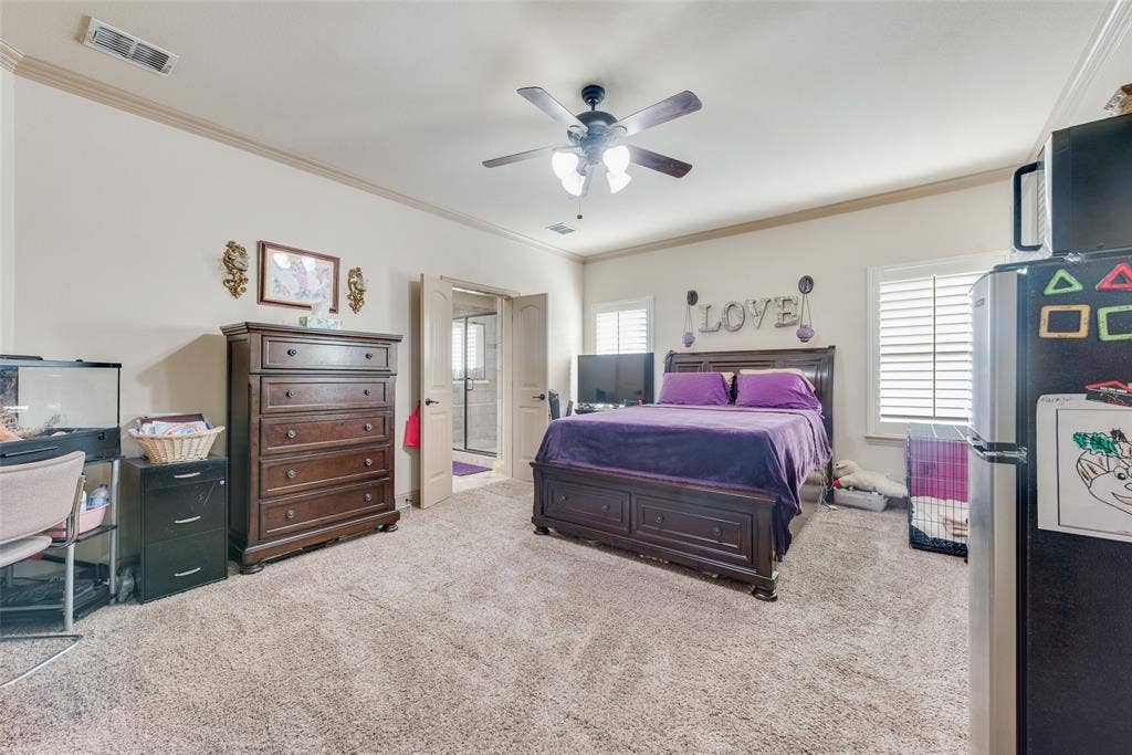 5056 Empire Way, Irving, TX 75038 Primary Bedroom #3 with ceiling fan and crown molding