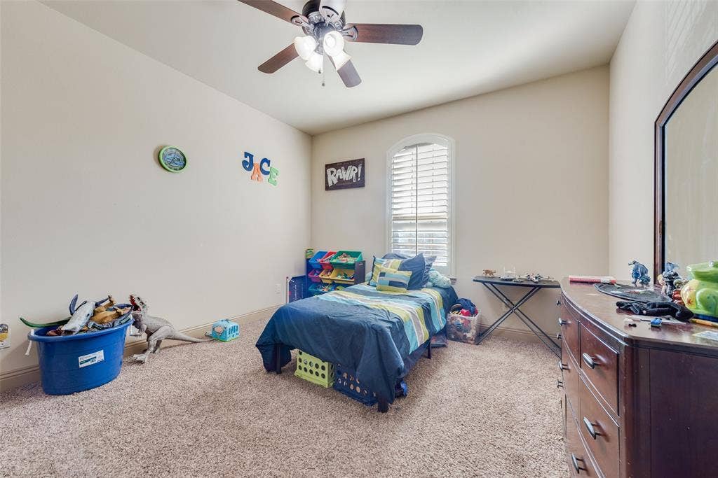 5056 Empire Way, Irving, TX 75038 Bedroom #6 with carpet and ceiling fan