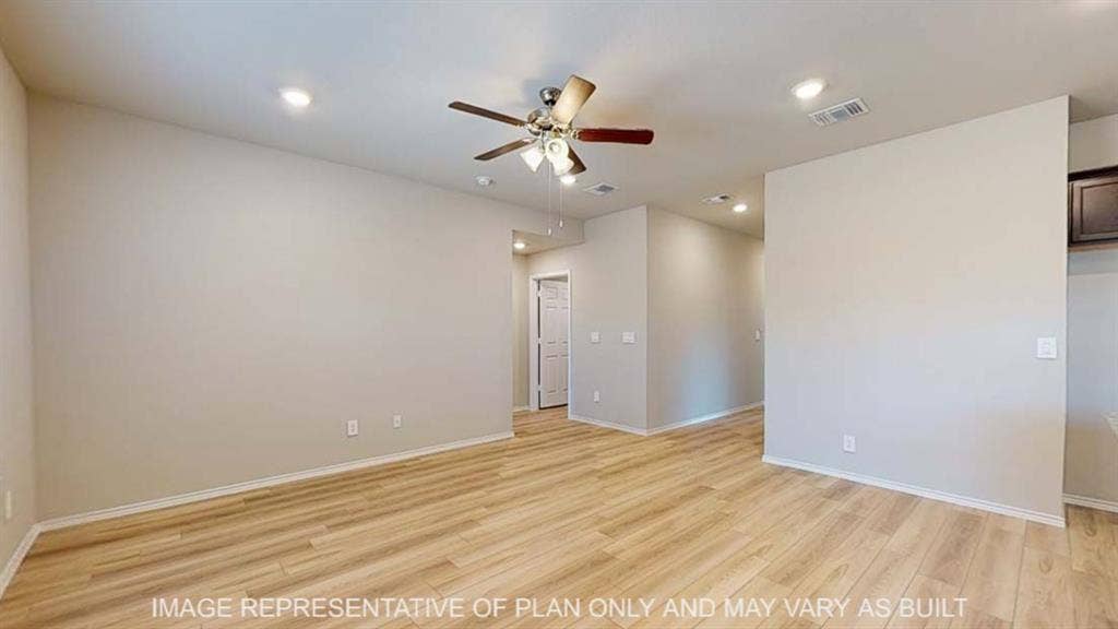 10412 Altair Drive, Waco, TX 76708 Wood-finish flooring, recessed lighting, and a ceiling fan with integrated lighting