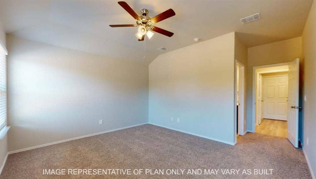 10412 Altair Drive, Waco, TX 76708 Carpeted flooring, ceiling fan with integrated lighting, window with blinds, and white panel doors