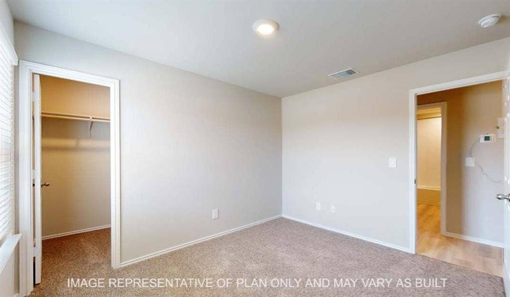 10412 Altair Drive, Waco, TX 76708 Recessed ceiling light, neutral wall paint, carpet flooring, window with blinds, and built-in closet shelving